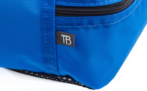A close shot of the TB tag on a Tri-Star Packing Cube.